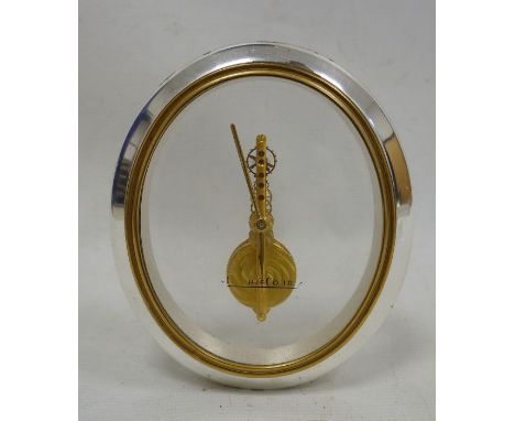 Jaeger Le Coultre mantel clock, the oval glass dial marked 'Jaeger Le Coultre', 16-jewels