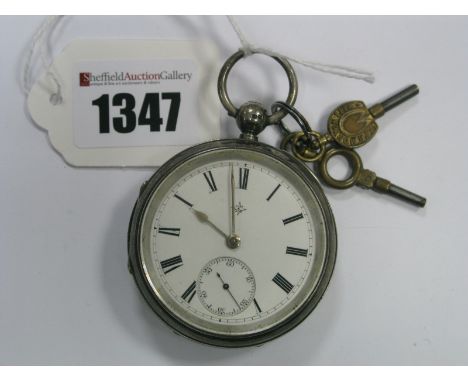 A Hallmarked Silver Cased Openface Pocketwatch, the white dial with black Roman numerals and seconds subsidiary dial, within 