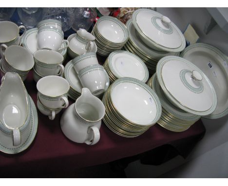 A Modern Royal Doulton Dinner and Tea Service, in the 'Berkshire' pattern decorated with green foliate borders, approximately