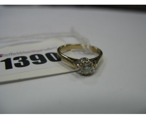 A 9ct Gold Single Stone Diamond Ring, the brilliant cut stone illusion set, stamped ".25".