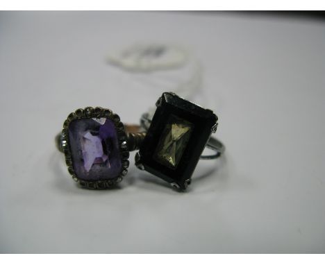 A Single Stone Ring, within stone set border (stones missing); together with an Art Deco style ring. (2)