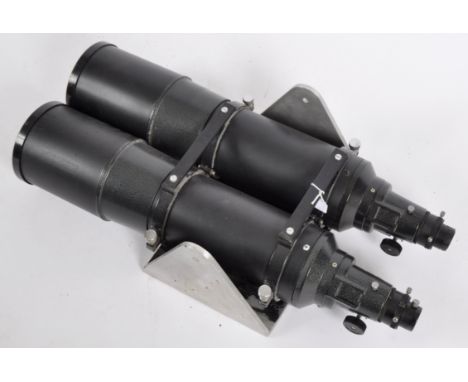 A pair of of matching large mounted telescopes.&nbsp; No makers name of magnification references present. Mounting plate beli