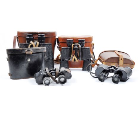 A collection of assorted cased vintage binoculars. Models are: Ross London Stereo Prism 8x, Bausch &amp; Lomb 6 x 30 marked w