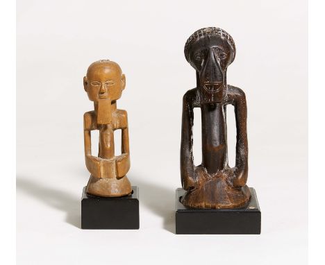 Zwei Halbfiguren. Datierung: 1920. Herkunft: Kasongo. Demokratische Republik Kongo. Material: Helles bzw. dunkles Holz, einma