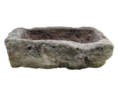 18th century weathered rough cut sandstone trough planter, rectangular form with shallow dugout centre  Location: Duggleby St