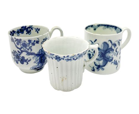 Three 18th century Worcester coffee cups, the first example of reeded form with lobed feet and scrolling handle, circa 1754, 