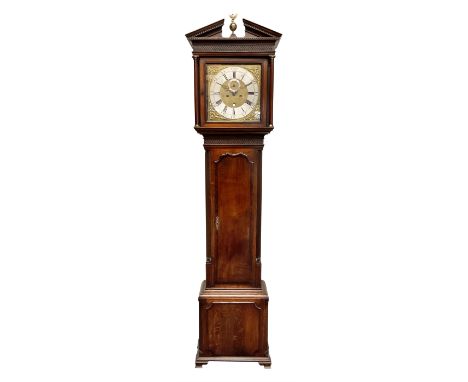 Early 19th century oak and mahogany banded longcase clock, the sloped arch and dentil pediment with central finial above blin