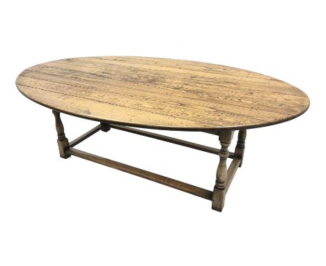 17th century style oval distressed light oak plank top dining table, rectangular stretcher base, L228cm, W150cm, H77cm