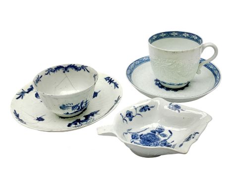 18th century Worcester coffee cup and saucer, each with moulded floral decoration and stylised trellis borders, cup H5.5cm, s