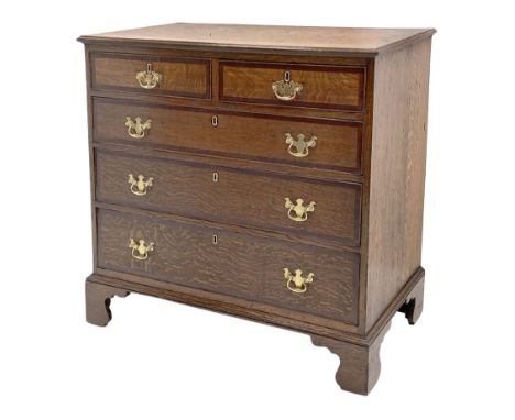 George III oak chest, rectangular top with moulded edge over two short and three long drawers each with mahogany banding, on 