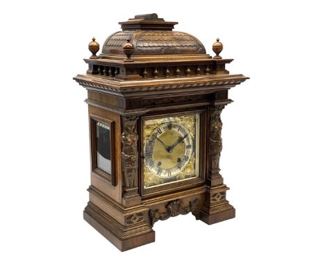 Late 19th century walnut cased architectural mantel clock, caddy pediment carved with tile effect raised on balustrade with t