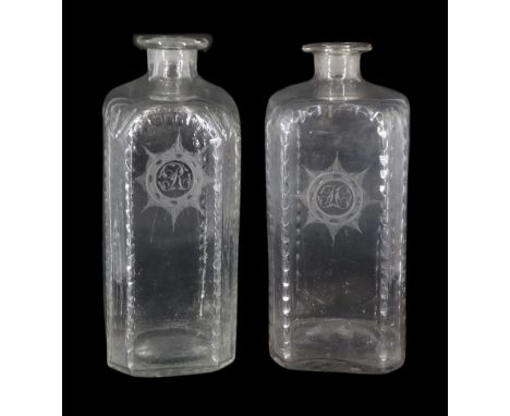 Pair of early 19th century square section decanters, with oval faceted borders and engraved sun burst panels initialled 'H' a