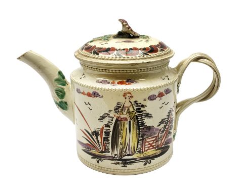 18th century creamware teapot, probably Leeds, with reeded entwined handle and floral finial to the cover, the body with hand