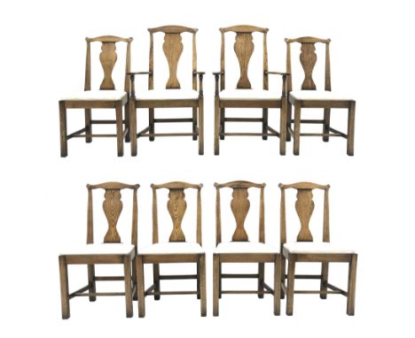 Set eight Georgian style distressed light oak chairs with upholstered removable seat pads, two carver chairs and six side cha