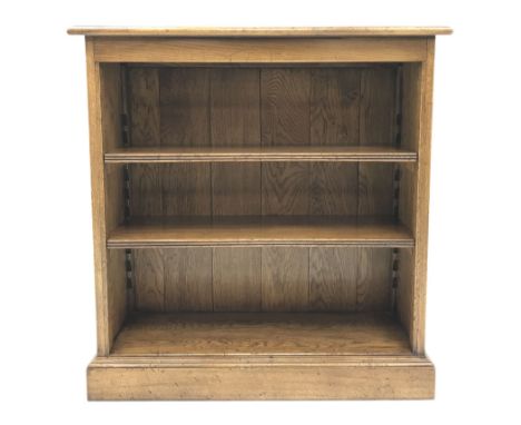 Distressed light oak open bookcase with two adjustable shelves,  W84cm, D31cm, H87cm