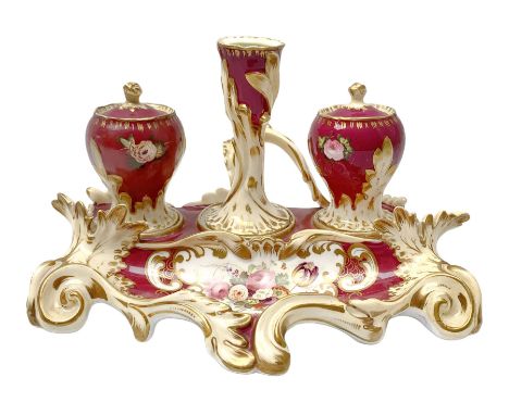 19th century desk stand, possibly Minton, of scrolling form the tray hand painted with floral spray before twin lidded inkwel