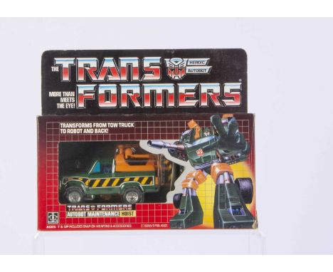 Vintage Hasbro Transformers G1 Autobot Hoist, in original box, opened bubble, complete with all weapons/accessories, instruct