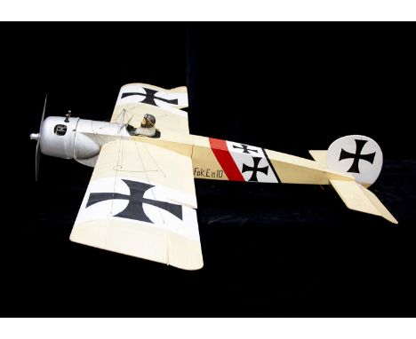A Radio Controlled kit built Fokker  Monoplane,  wood construction, finished in German WW1 beige, silver and red with Pilot, 