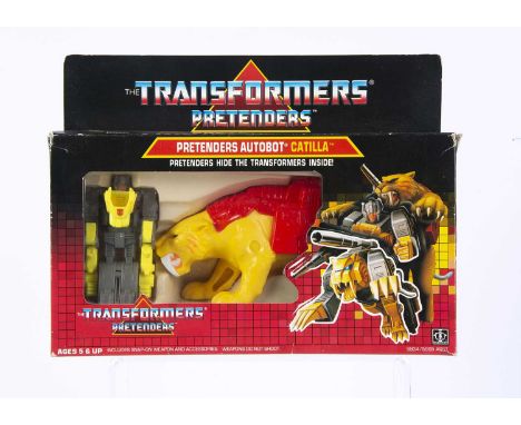 Vintage Hasbro Transformers G1 Autobot Pretenders Catilla, in original box, opened bubble, complete with all weapons/accessor