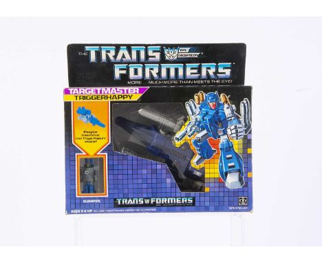 Vintage Hasbro Transformers G1 Decepticon Targetmaster Triggerhappy, in original box, opened bubble, complete with Blowpipe, 