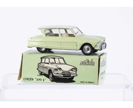 A Solido Citroen AMI 6, pale green body, white roof, off-white interior, spun hubs, in original box, E, one chip to base of r