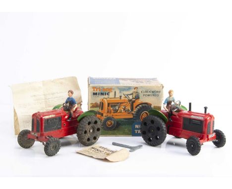 A Boxed Tri-ang M.3079 No.2 Nuffield Tractor, a clockwork powered model with operational mechanism, G-VG complete with driver
