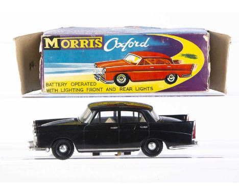 OK Toys (Hong Kong) Plastic Battery Operated Morris Oxford, No.3356 A, black body, beige interior, chrome trim, 'Dunlop' tyre