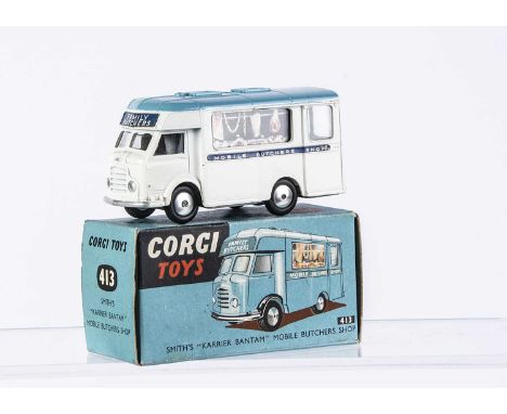 A Corgi Toys 413 Smith's Karrier Bantam Mobile Butchers Shop, white body, light blue roof, 'Family Butchers' labels, flat spu