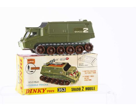 A Dinky Toys 353 UFO Shado 2 Mobile, green body and roof, off-white interior, brown rollers, silver tracks, light green base,