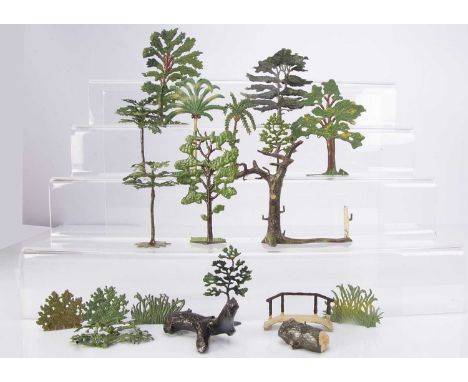 Lead trees and related accessories by various makers including Britains comprising Britains New Model Tree (12 trunks, a lot 
