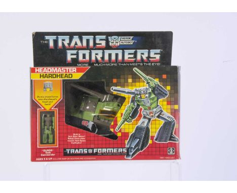 Vintage Hasbro Transformers G1 Autobot Headmaster Hardhead, in original box, opened bubble, complete with Duros Tank Commande