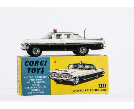 A Corgi Toys 481 Chevrolet Impala Police Car, white/black body, red roof light, lemon interior, two policemen, 'Police' decal