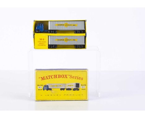 A Matchbox Lesney Major Pack M-9 Inter-State Double Freighter, dark blue cab and central bogey, silver trailers, yellow/blue 