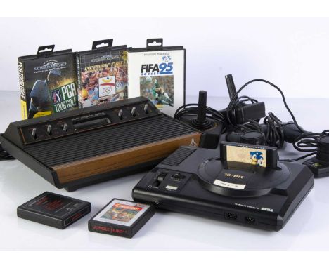 Vintage Games Consoles, Atari CX2600 'Woody' Games Console with two Joysticks, Paddles and two game cartridges (Jungle Hunt a