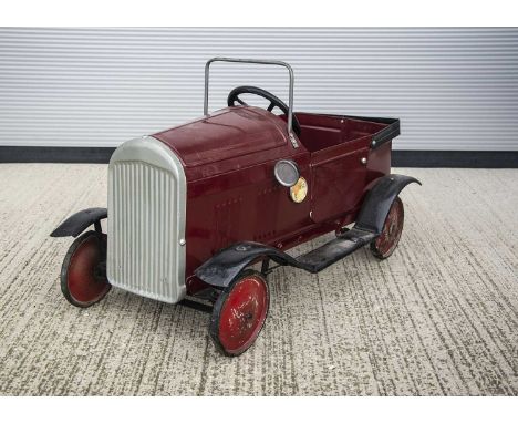 A Tri-ang Toys Bentley Tourer Pedal Car, as shown in the 1940's catalogues, repainted pressed steel body in maroon with silve