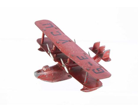 A Pre-War Dinky Toys 60m Four Engined Flying Boat, red body, 'G-EVCU' markings, four silver two blade props, hollow bow, wood