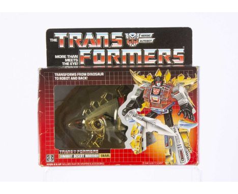 Vintage Hasbro Transformers G1 Autobot Dinobot Snarl, in original box, opened bubble, complete with all weapons/accessories, 