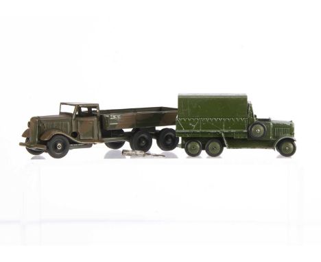 A Tri-ang Minic Tinplate Clockwork 66M Six Wheel Army Lorry, c.1940, camouflage body, black anodized wheels, G, with a pre-wa