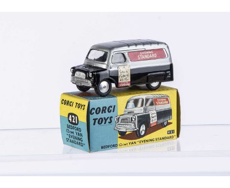 A Corgi Toys 421 Bedford 12 cwt 'Evening Standard' Van, black body, silver ridged roof, undivided windscreen, 'Evening Standa