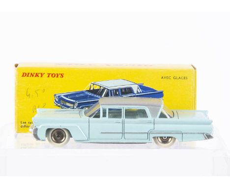 A French Dinky Toys 532 Lincoln Premiere, light blue body, silver roof, concave hubs, in original box, E, a few small chips t