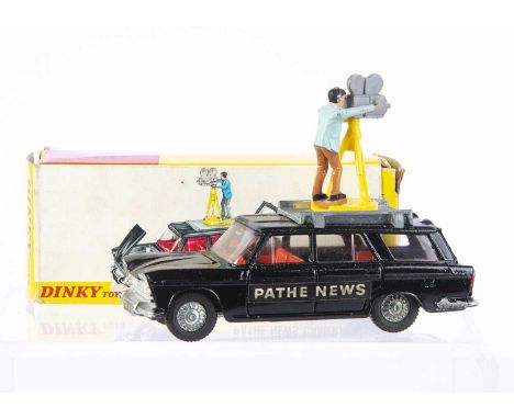 A Dinky Toys 281 Fiat 2300 Station Wagon 'Pathe News' Camera Car, black body, red interior, cast wheels, cameraman in brown t