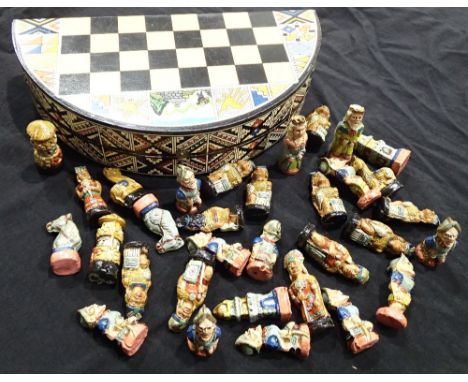 Boxed unusual South American miniature ceramic chess set with travel board/case