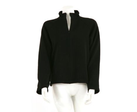 A Jil Sander black knitted pullover,with zip front, zipping down to midway, long sleeves and short collar, size 40