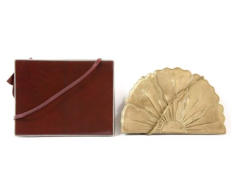 An original vintage Clive Shilton handbag,in the form of a flower in gold metallic leather with gold metal edging, a single f