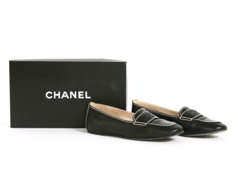A pair of vintage Chanel black leather loafers,with white stitching detail and double 'C' logo, in box,size 37 (2)