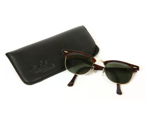 A pair of vintage Ray-Ban 'Clubmaster' sunglasses,by Bausch & Lamb USA, c.1989, tortoiseshell and gold-tone frames, with blac