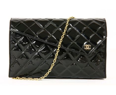 A vintage Chanel black patent quilted clutch handbag,with silver-tone double 'C' monogram to a diagonal flap, gilt metal chai
