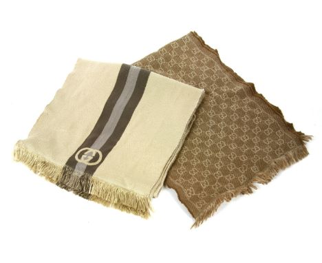Two Gucci cream wool scarves,one with woven dark grey and light grey stripe and double 'G' monogram, the other a brown wool s
