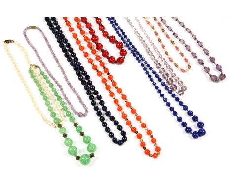 A single row Peking glass bead necklace,a single row graduated amethyst bead necklace,a single row faceted garnet bead neckla