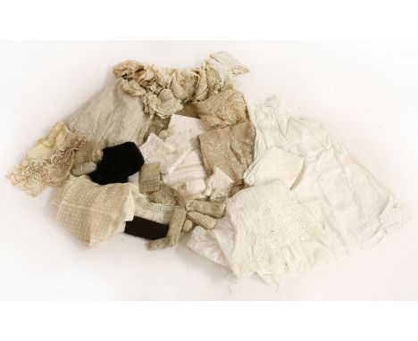A collection of antique and vintage textiles and lace,to include Victorian and later undergarments,a highly embroidered white